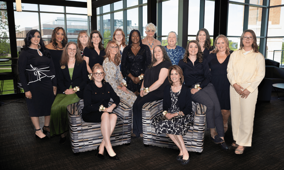 A group of women smiling.